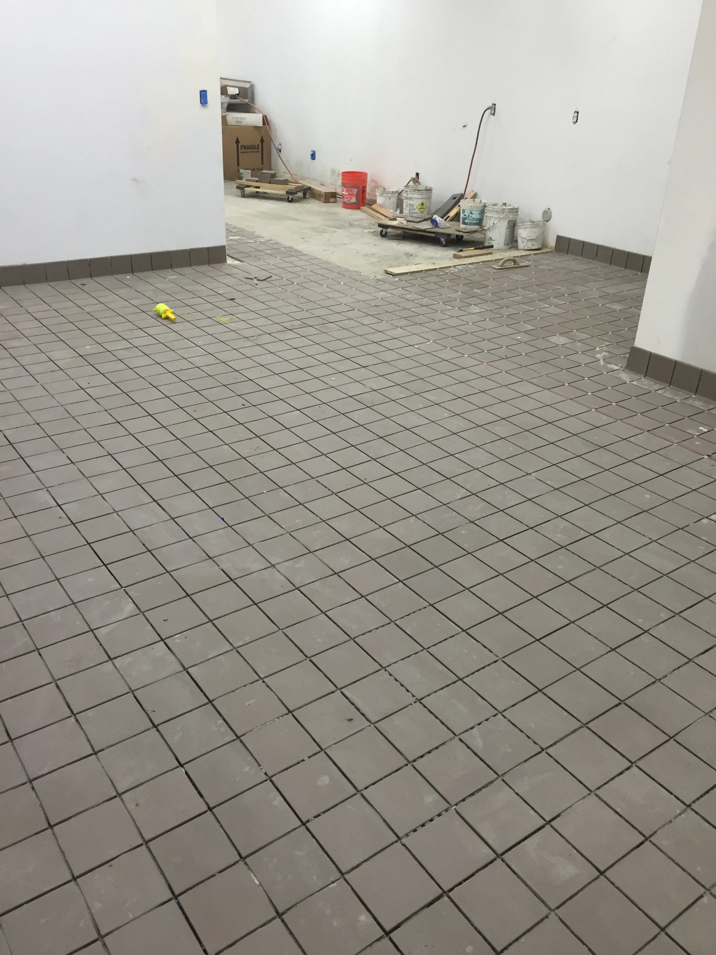 Corner of our decorating room. Our walk-in fridge will be in the opposite corner. 