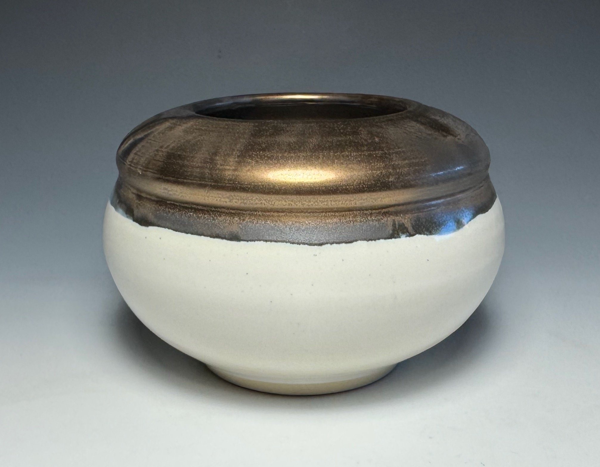 Small Round Bronze and White Vessel 