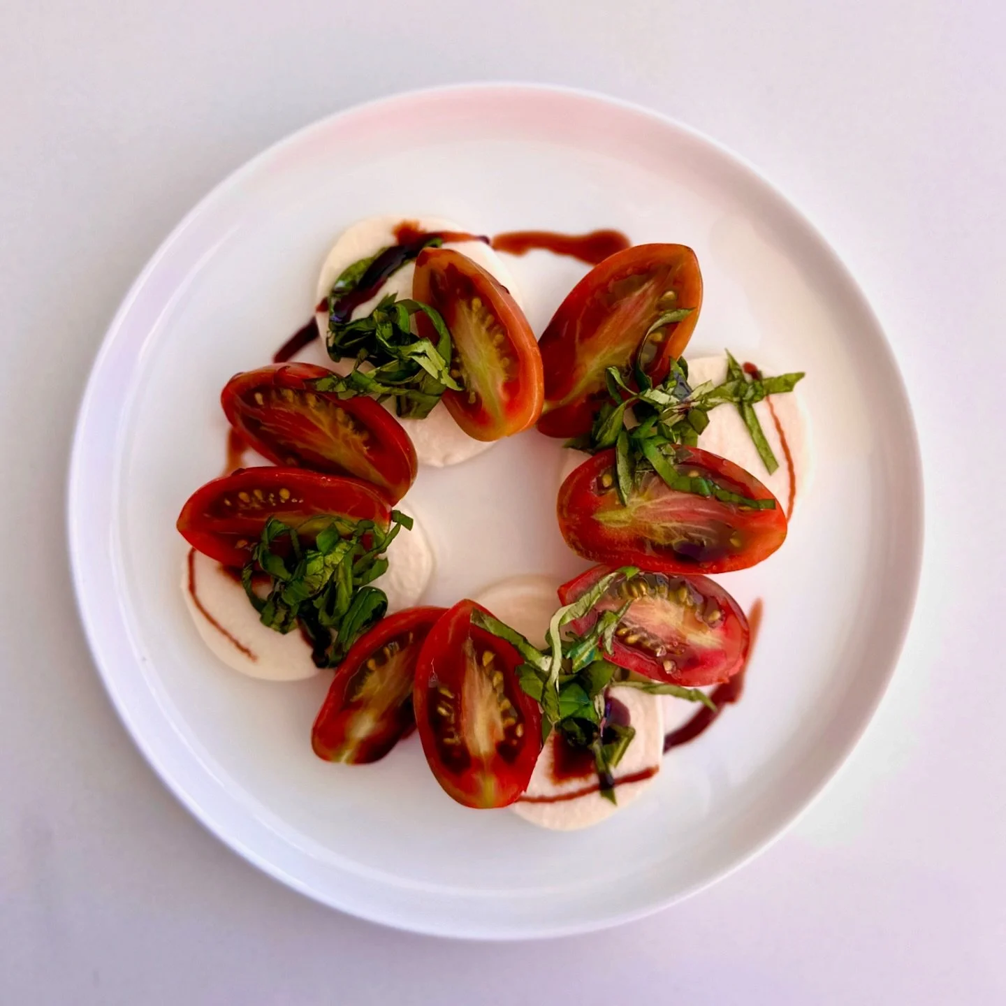 Life&rsquo;s been hectic, but there were some moments of quiet joy. 

Insalata Caprese with heirloom tomatoes from the farmers market. Juicy, tender, and bursting with flavours of the Sun.