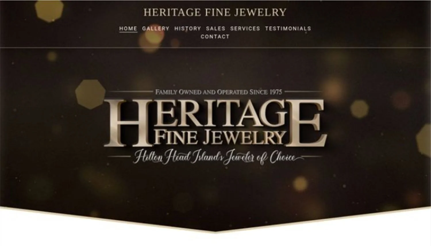 Heritage Fine Jewelry website homepage with a dark background and gold accents, featuring navigation links for home, gallery, history, sales, services, testimonials, and contact, and centered text highlighting the jewelry store's details and location in the Helen Head Islands.