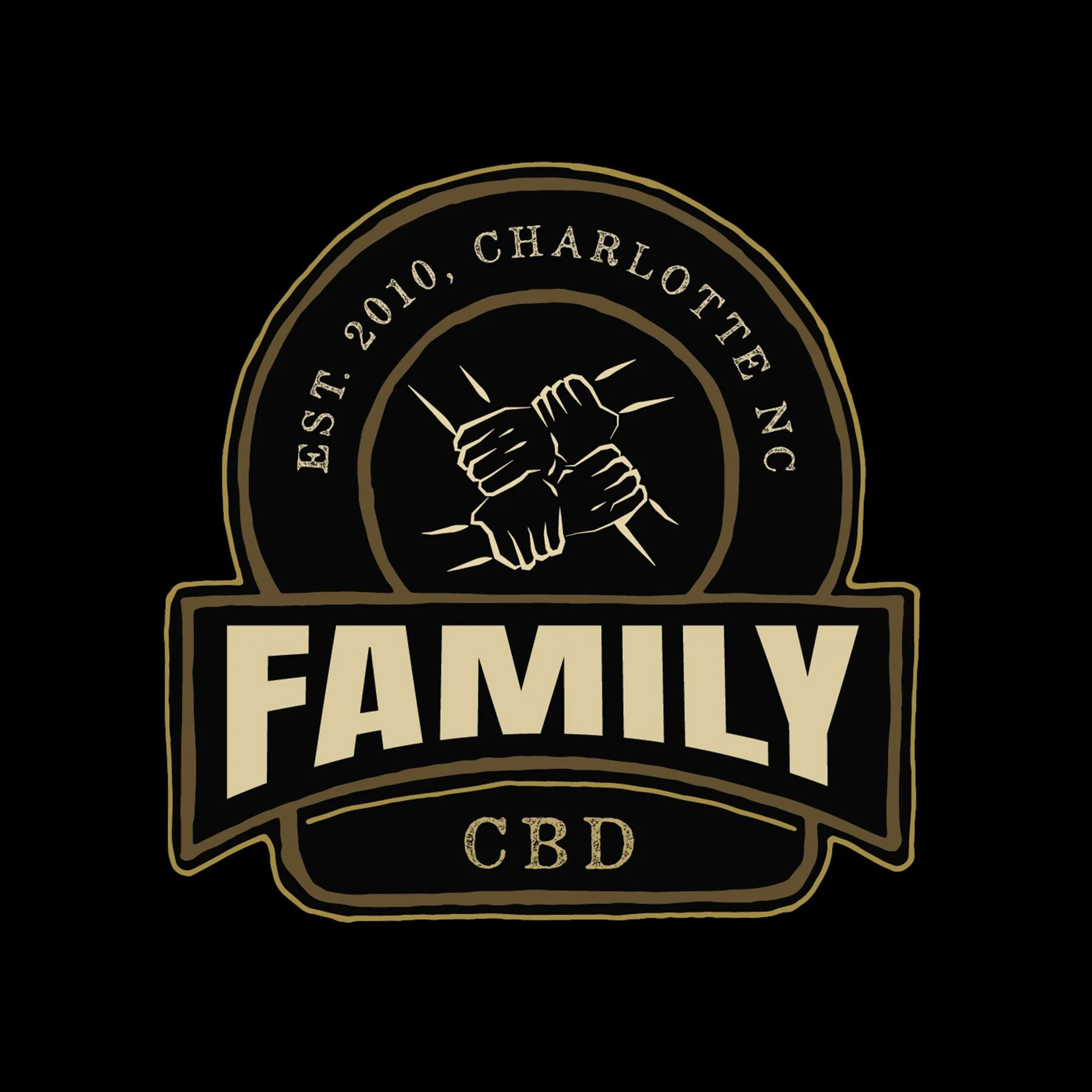 A black and gold emblem with the text "Family CBD" and a graphic of two fists shaking in the center, with additional text indicating "est. T. 2010, Charlotte, NC".