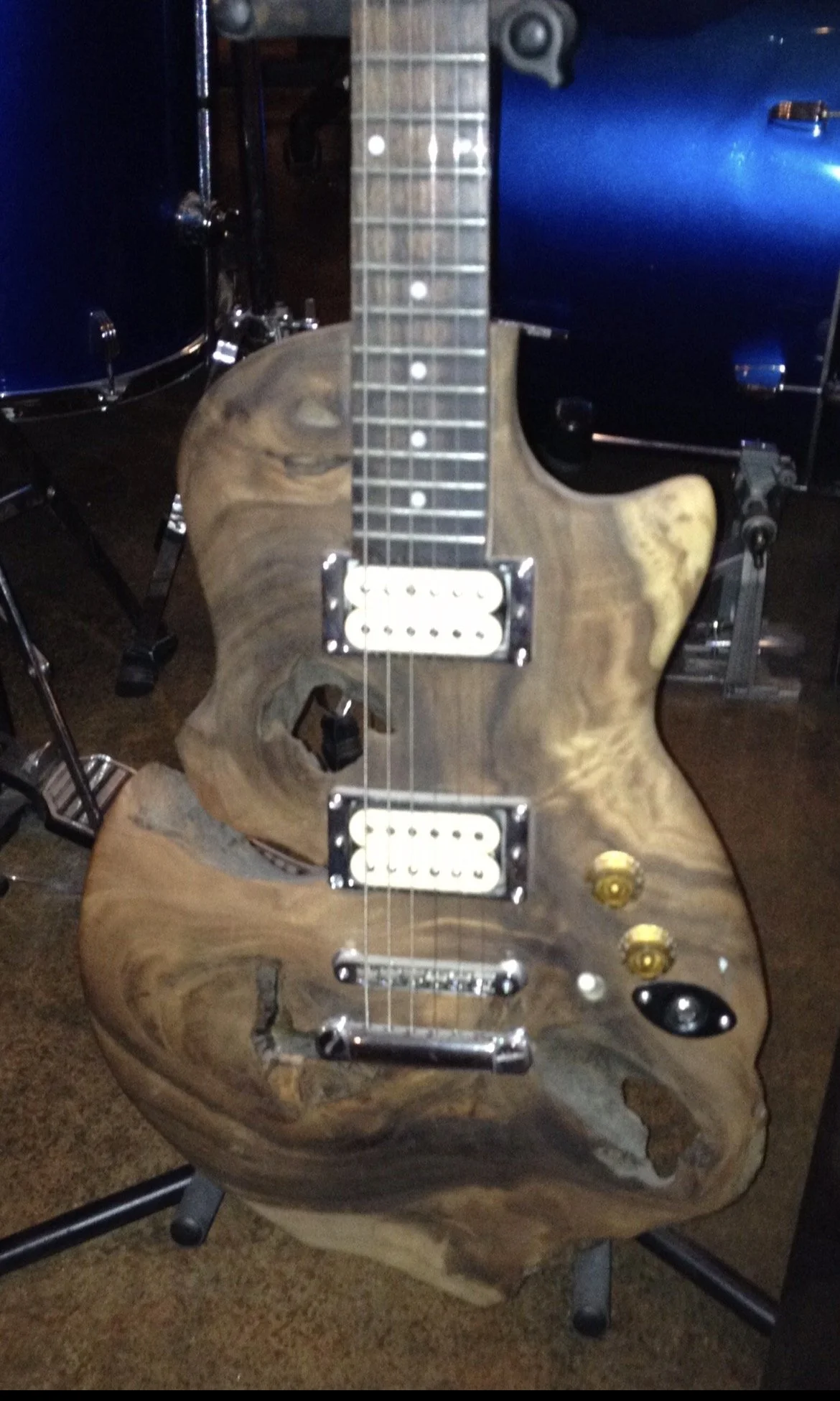 Electric guitar made of monkey pod