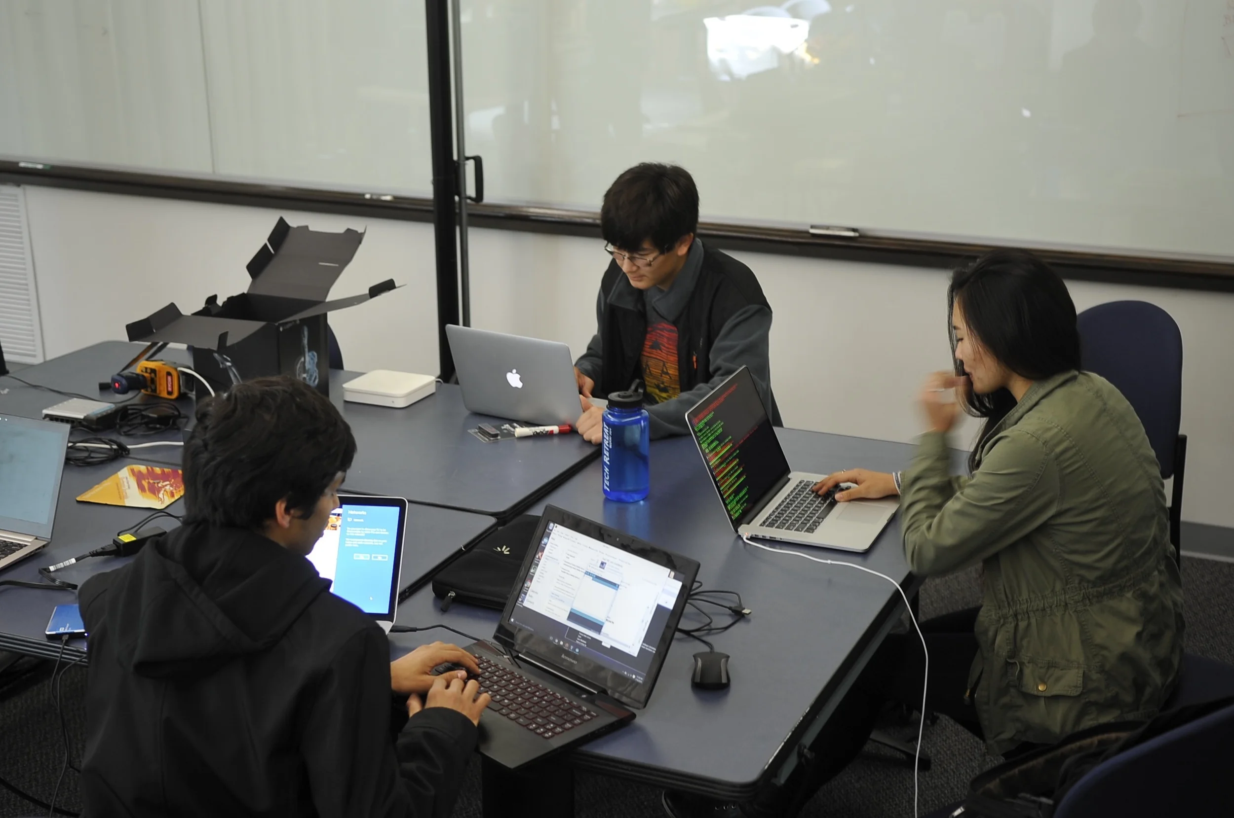 Riviera Robotics programmers work after the FIRST Kickoff 2016.