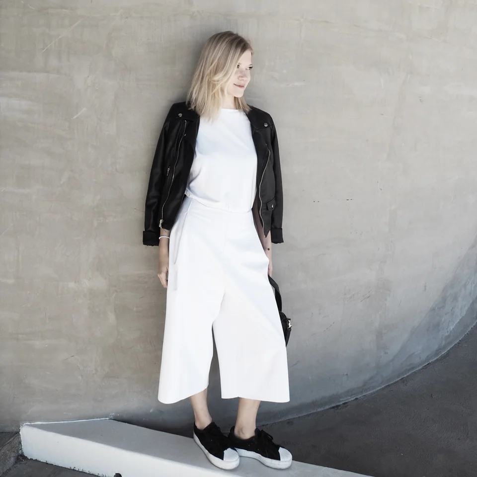  Biker jacket by Zara , viscose Tee by WE.RE , softshell culottes by Odivi and sneakers by Adidas .