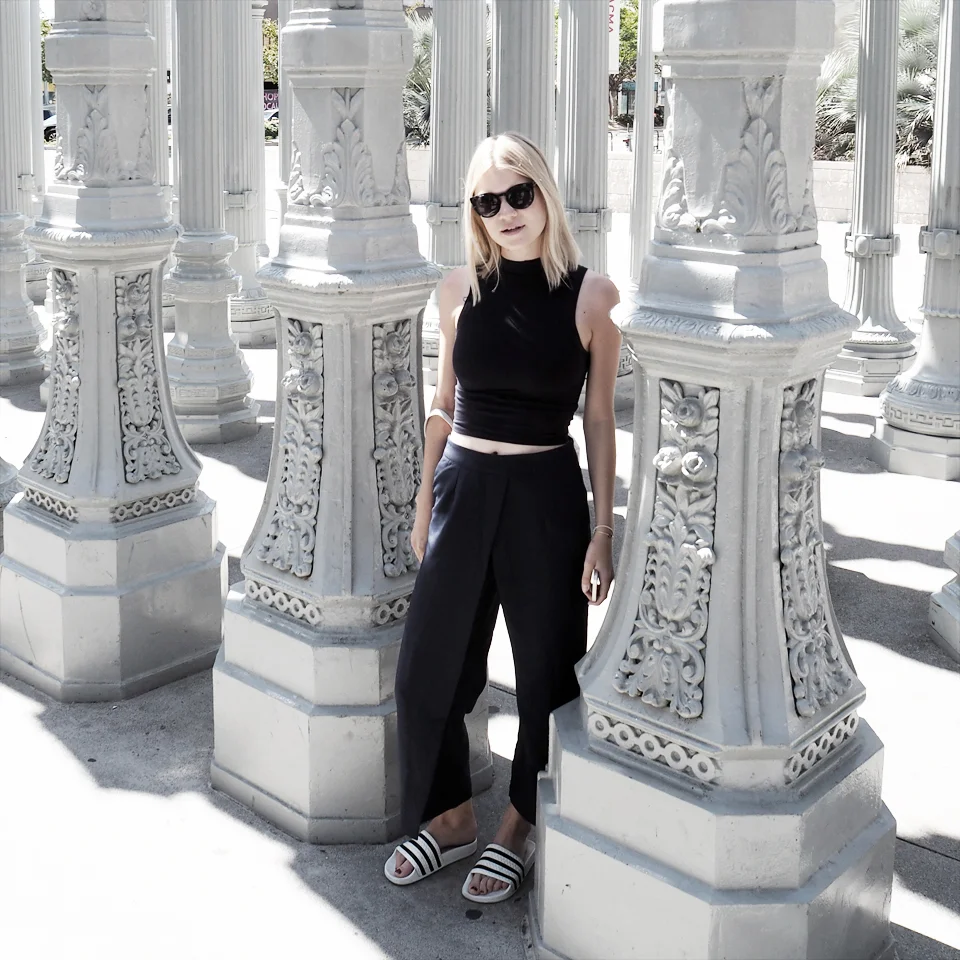 Crop top by ASOS , flouncy pants by Lavish Alice , sunnies by Komono (via Freshlabels.cz) and pool slides by Adidas .