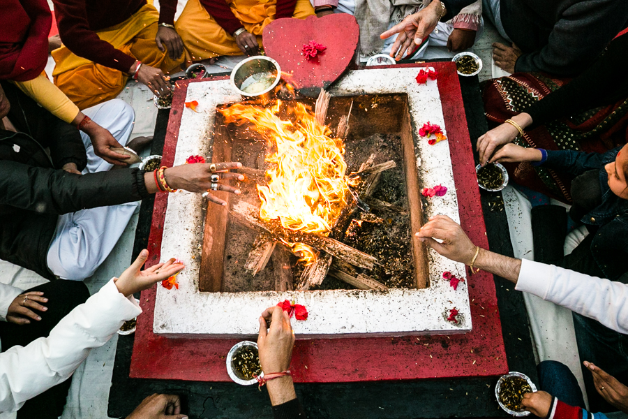  Participants releasing oblations into the ceremonial fire. 