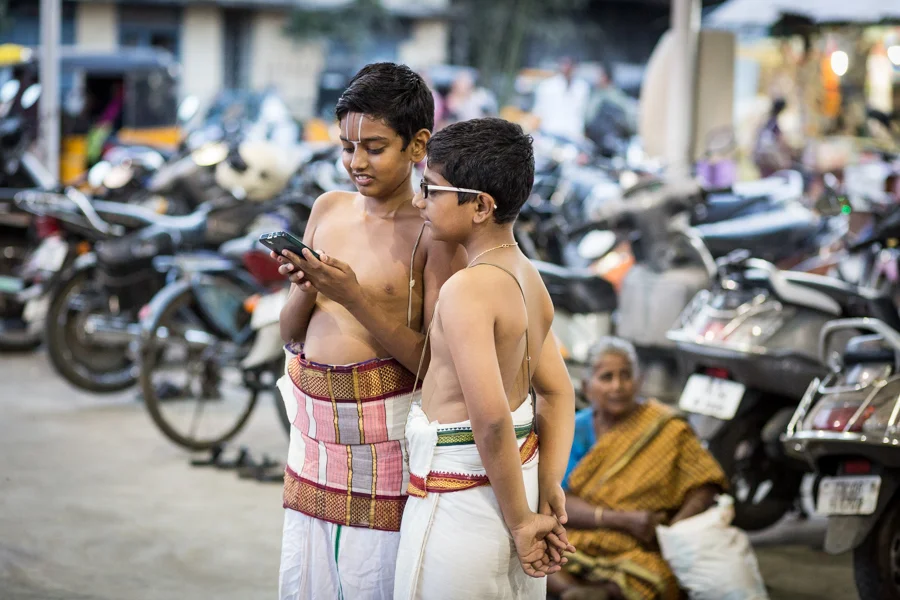 Two young worshipers taking a break from temple activity. 