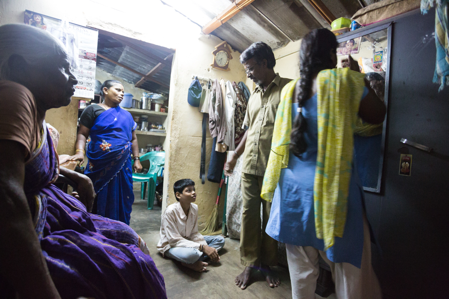 Rajendran and his family in their home.