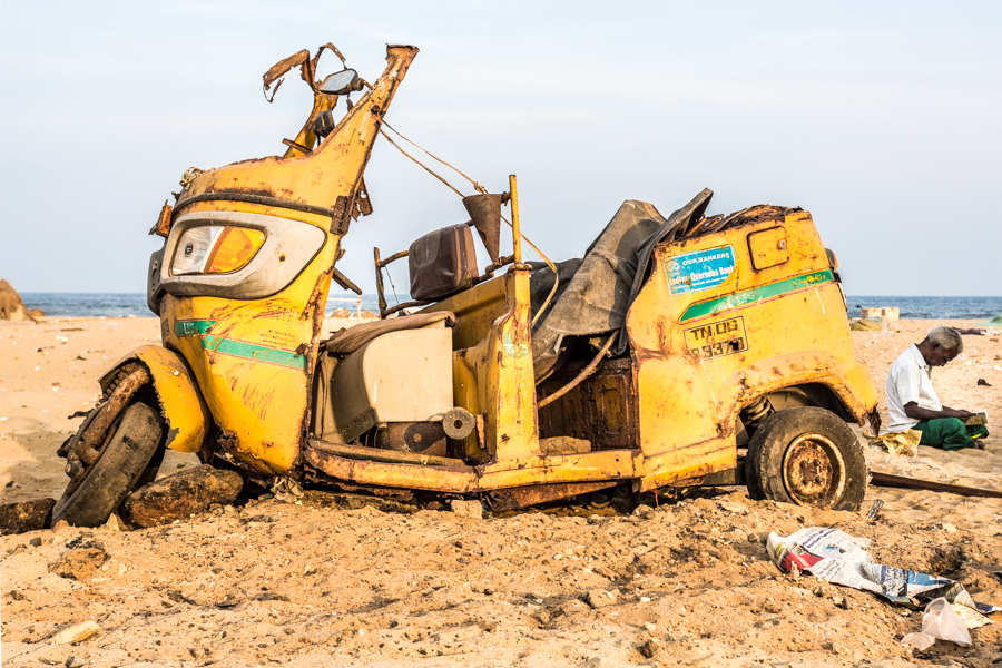 A tuk-tuk decomposing on the beach in Chennai. Although far from pristine, locals still flock to Chennai's beaches to fly kites and picnic.