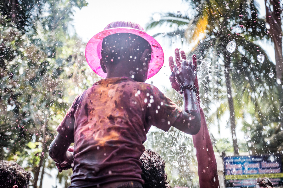 Town people used water hoses to spray the revelers.