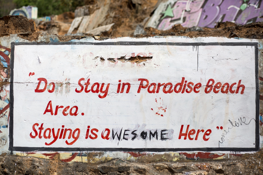 Graffiti in Paradise. Police and Coast Guard typically turn a blind eye to hammock-slinging beach bums coming for a taste of Paradise.