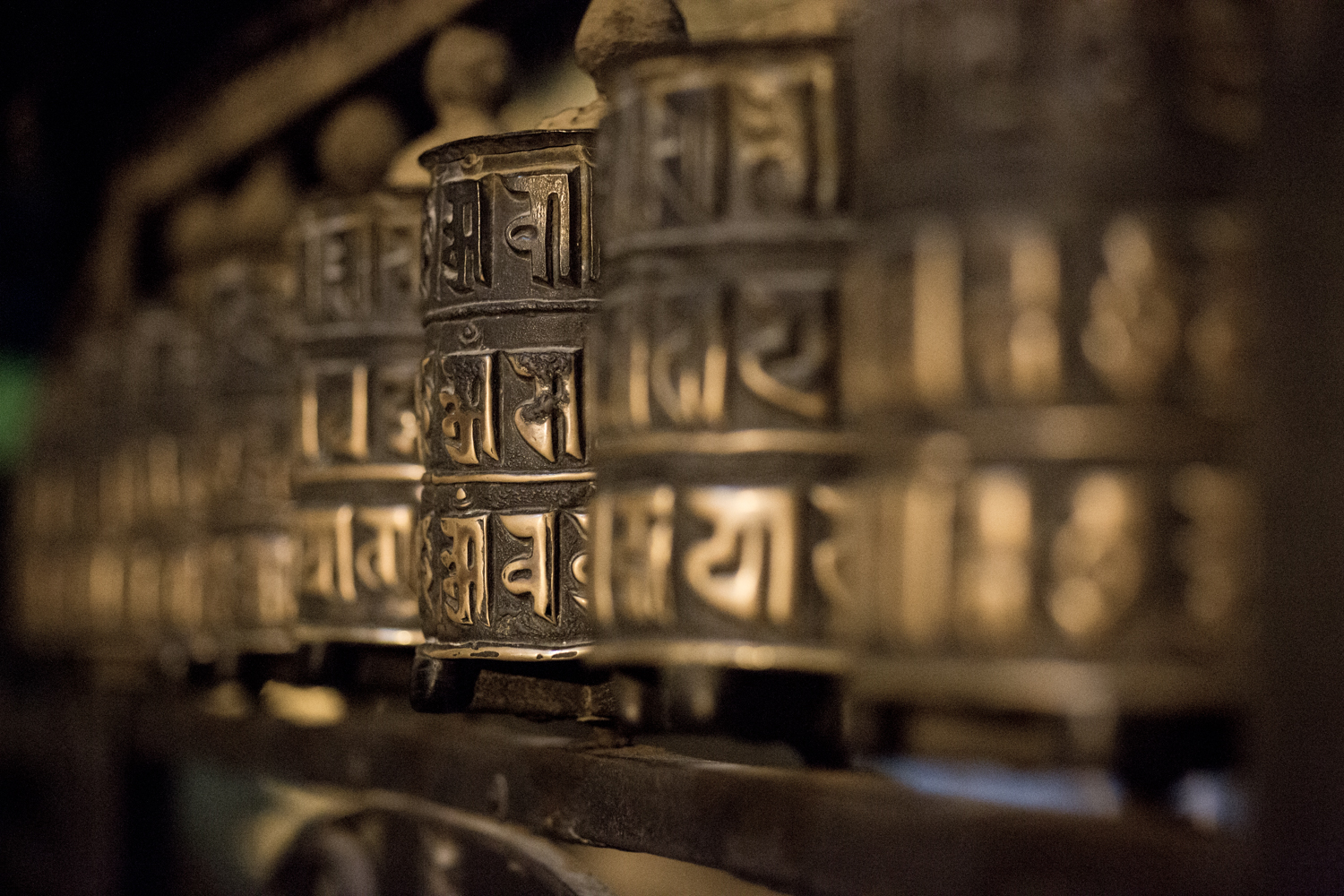 Prayer wheels at Swayambhunath (also known as the "Monkey Temple") in Nepal. The uphill slog to Swayambhunath is worth the paranoramic view of the city. 
