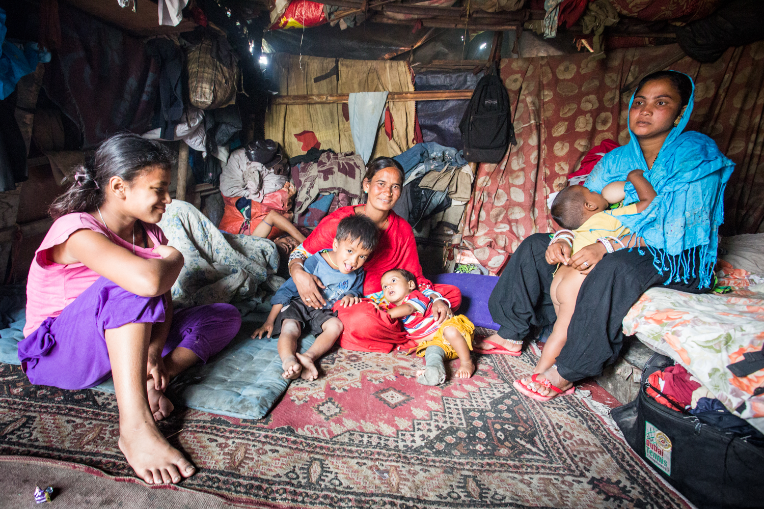 Rajasthani immigrants inside their makeshift home erected in an unused field in Kathmandu. This family will be the subject on a future piece on women and the begging economy. 