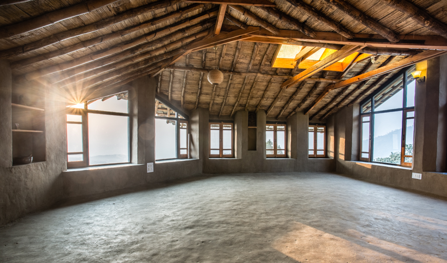The second-story meditation and yoga space offers a beautiful setting for spiritual practice and workshops.