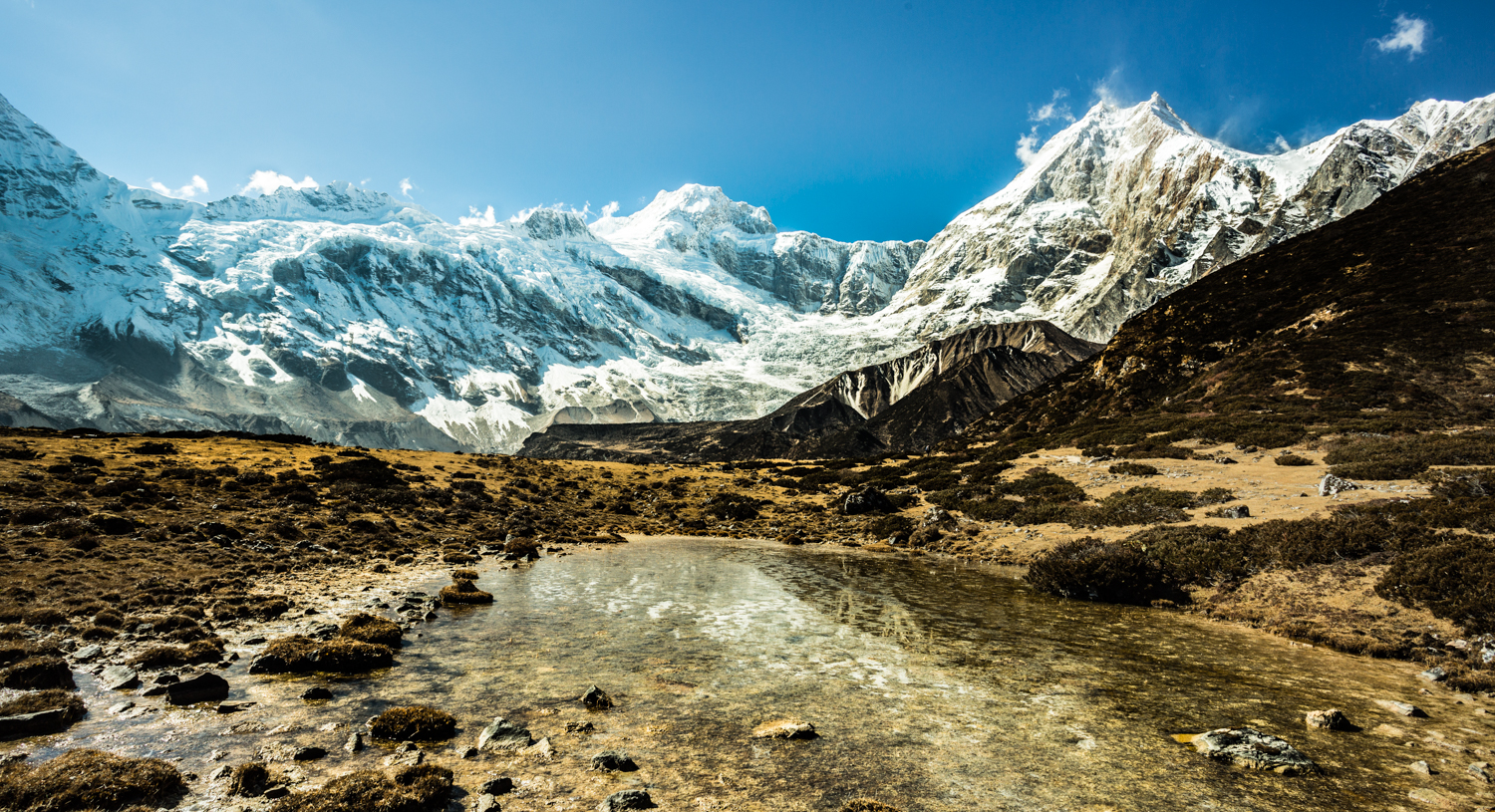 A section of the Manaslu massif. Manaslu is on the far, easily recognizable by its doubled-edged peaks. 