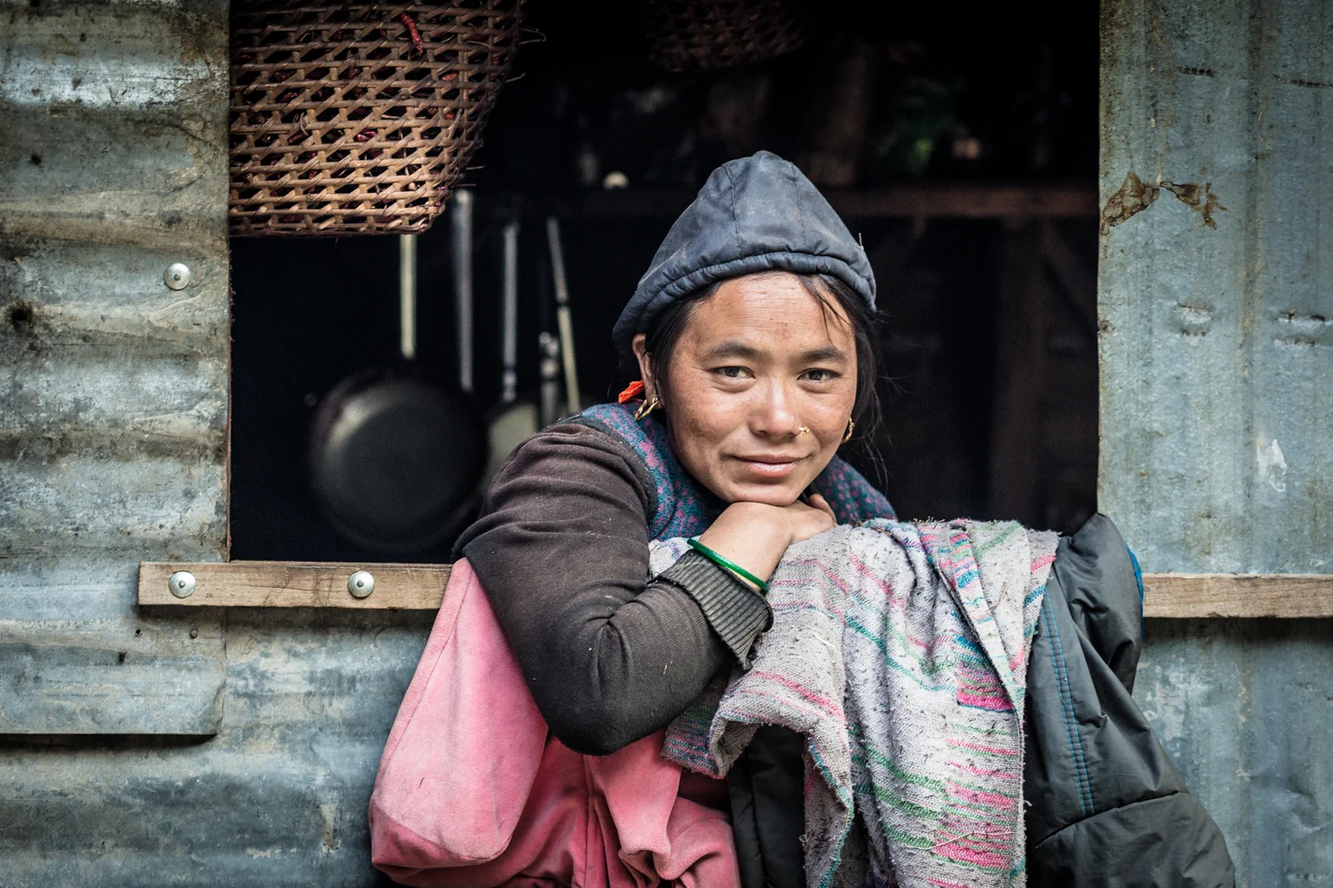 An ethnic Tibetan woman inside her teashop. 