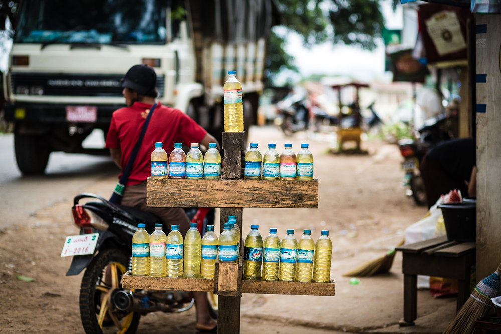  Petrol for sale in re-used plastic water bottles. &nbsp;Very common in Indochina.&nbsp; 
