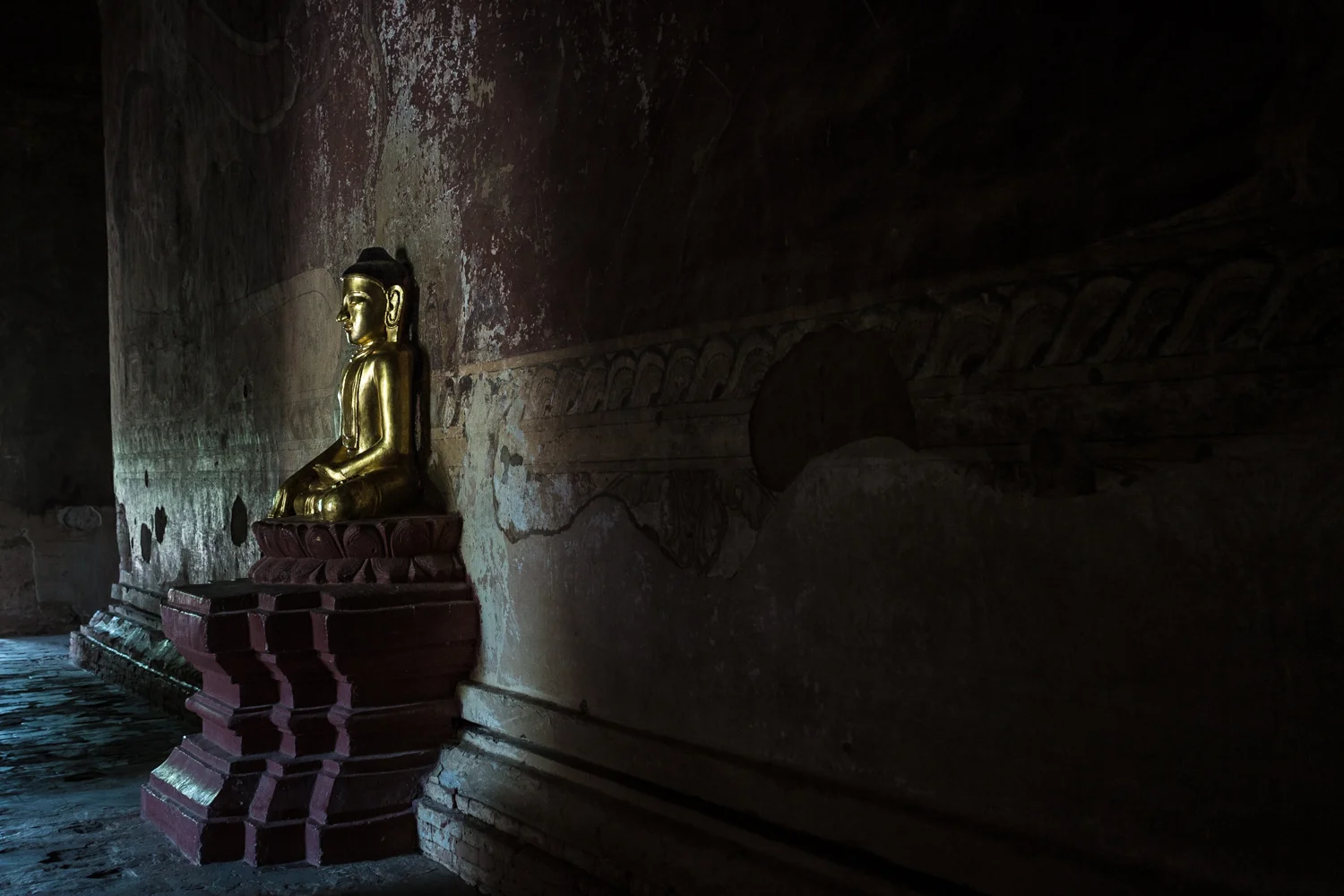 Relatively new Buddhas grace otherwise ancient structures. 