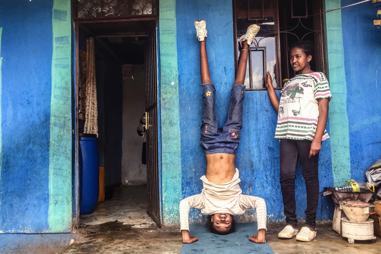 I taught yoga to the kids. Ketamesh (left) stayed after class to work on more advanced postures.