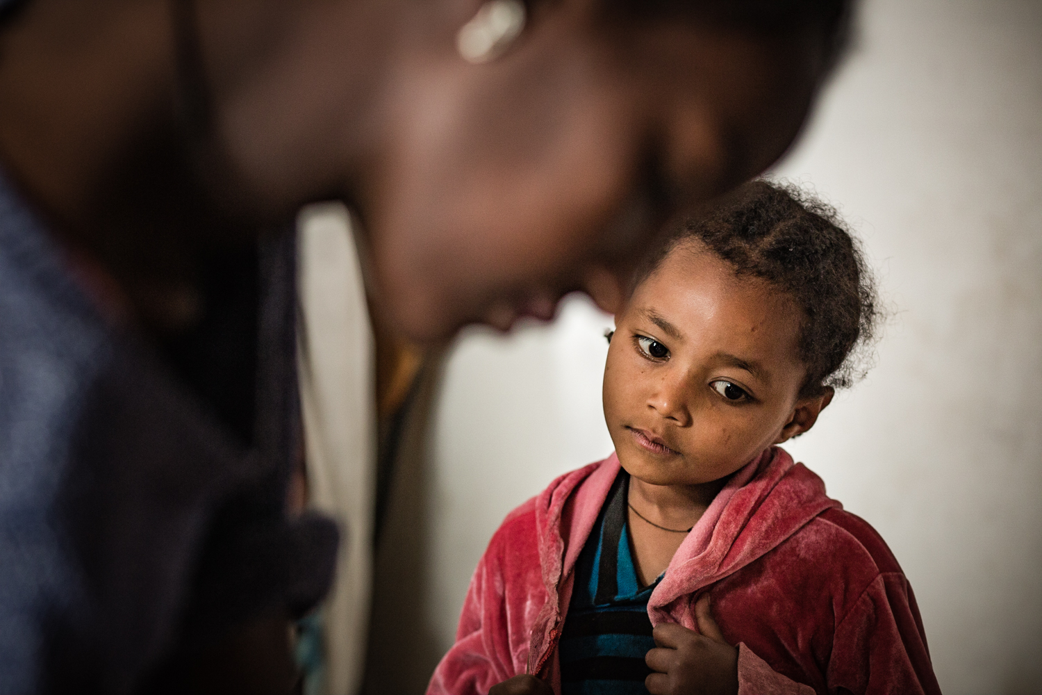 Selam Girma, Betasab's social worker, meeting a new Learning Lions student. 
