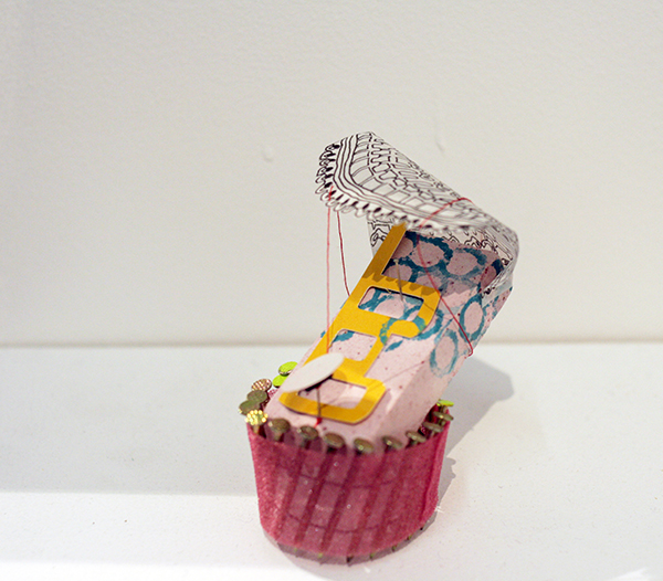THIS IS A STORY TOLD OVER A BREAK Plaster, nails, tracing paper, ink, letter stencil, athletic wrap 2014 2'' x 2'' x 2''