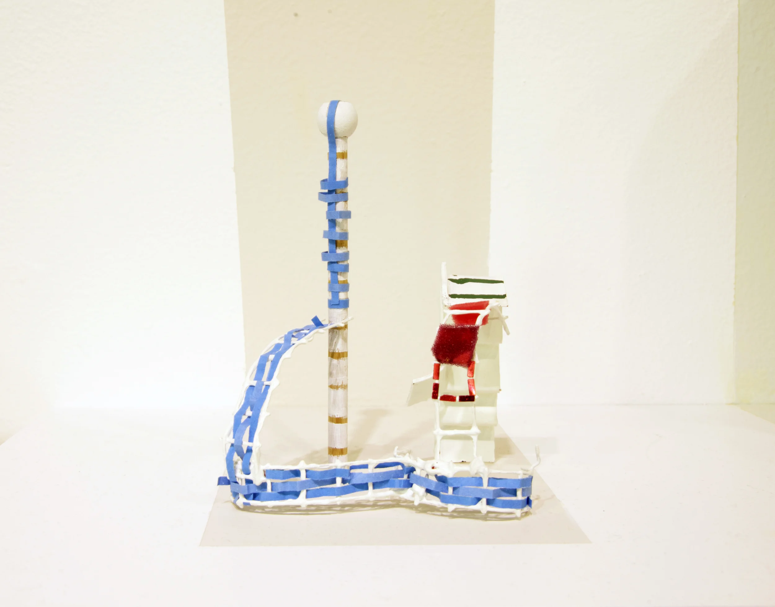 A STORY FOUND IN STILLNESS Small dowels, raffia, cookie cutter, metal cage, star confetti, clown nose 2015 5.5'' x 4'' x 2''