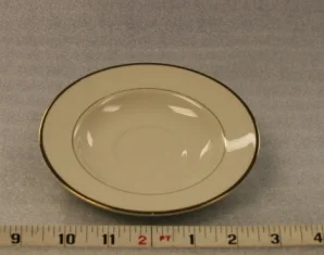 Ivory and Gold SaucerHeight 1" Width 5 3/4"$0.70