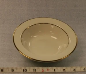 Ivory and Gold Soup PlateHeight 2" Width 7"$0.70