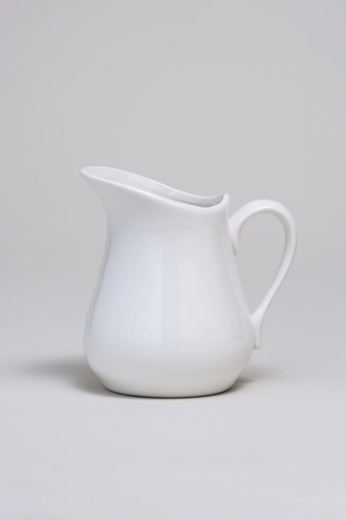 Porcelain Pitcher 12 oz.$2.00