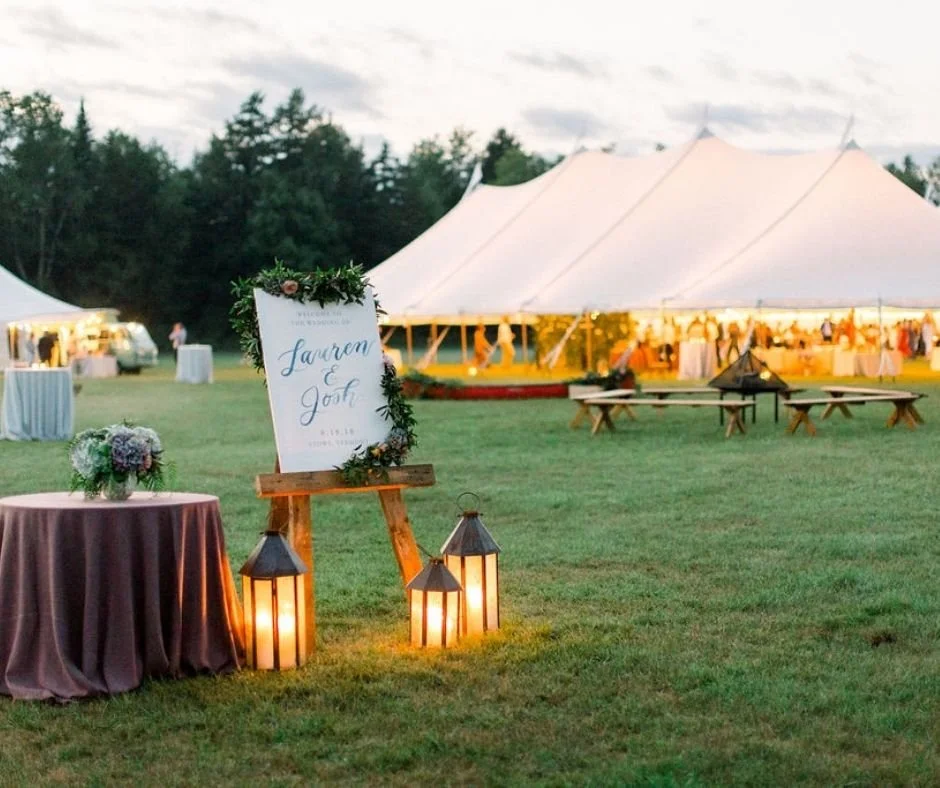 Outdoor event tent illuminated with party light rentals
