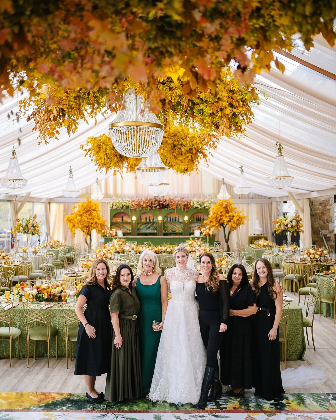 Michelle Leo Events local Utah wedding planning team with a bride at a luxury wedding reception, showcasing the expertise and benefits of hiring a local wedding planner.