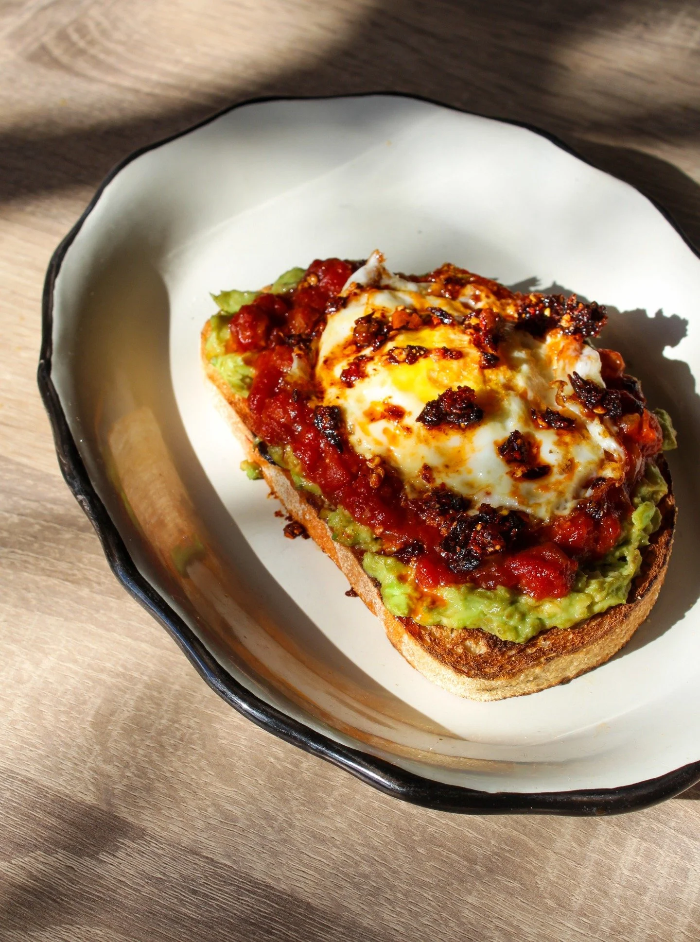 Some ๐fall brunch items that hit the menu this week. 
 Hot & Crispy Avocado Toast - sliced avocado, harissa-spiced roasted tomato and chickpeas, a fried egg topped with hot and crispy oil ๐ณ
Sweet Potato French Toast - cinnamon swirl bread bat