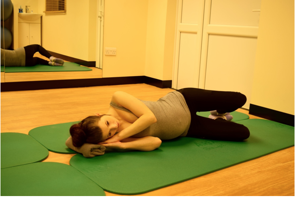 This one is better done laying on the floor, but you can perform it laying on the bed. So try and make it part of your morning or evening routine.