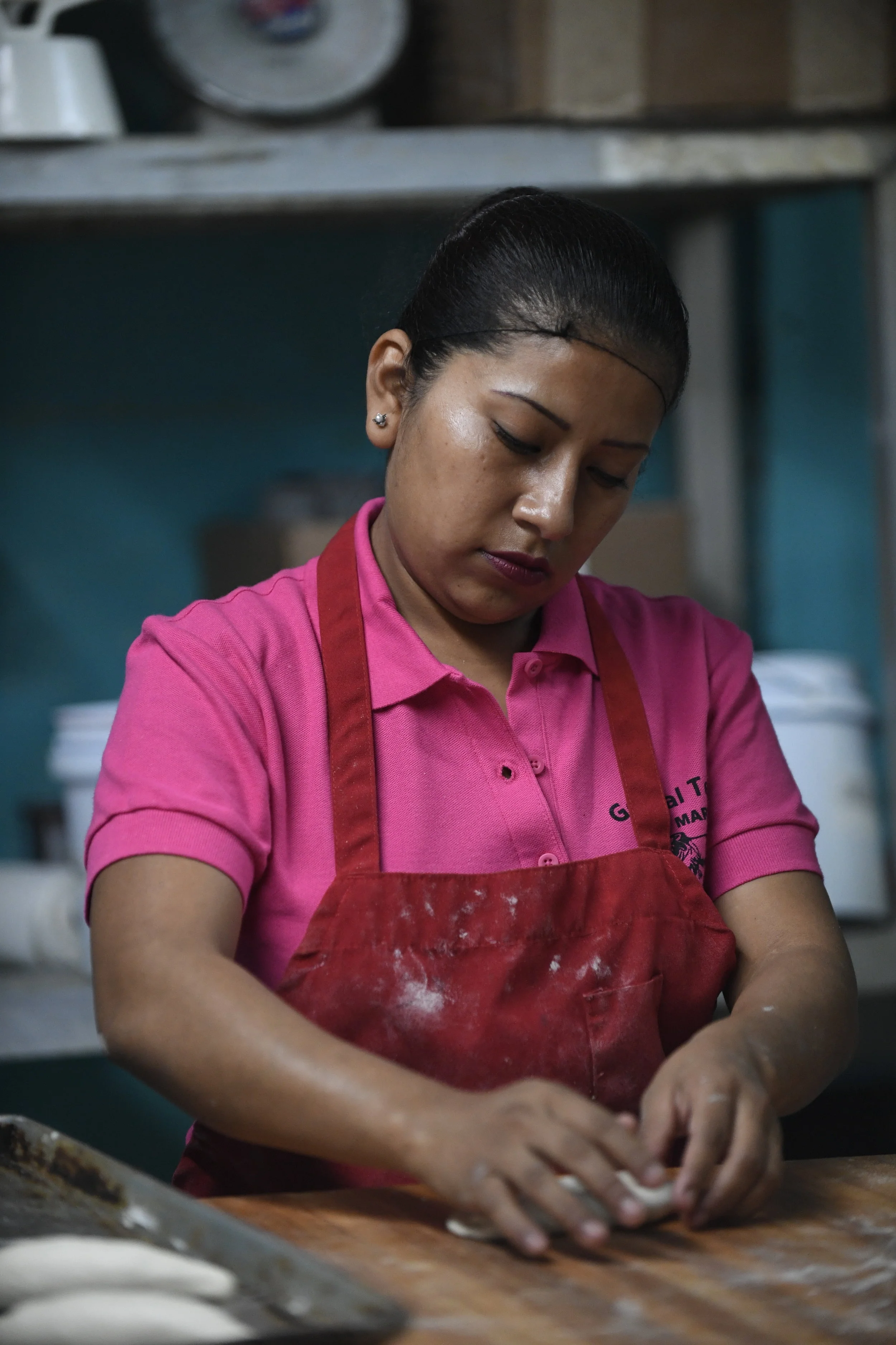 Lulu De La Garza kneads dough at her bakery in Clute on Tuesday, Jan. 9, 2017. De La Garza learn all of her baking skills in this bakery. 