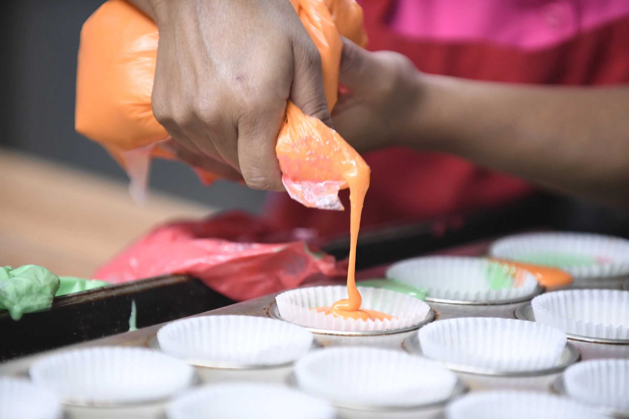  Lulu De La Garza pours muffin dough into a baking sheet at her bakery in Clute on Tuesday, Jan. 9, 2017. De La Garza likes to travel to Mexico and learn new ways of baking bread. 