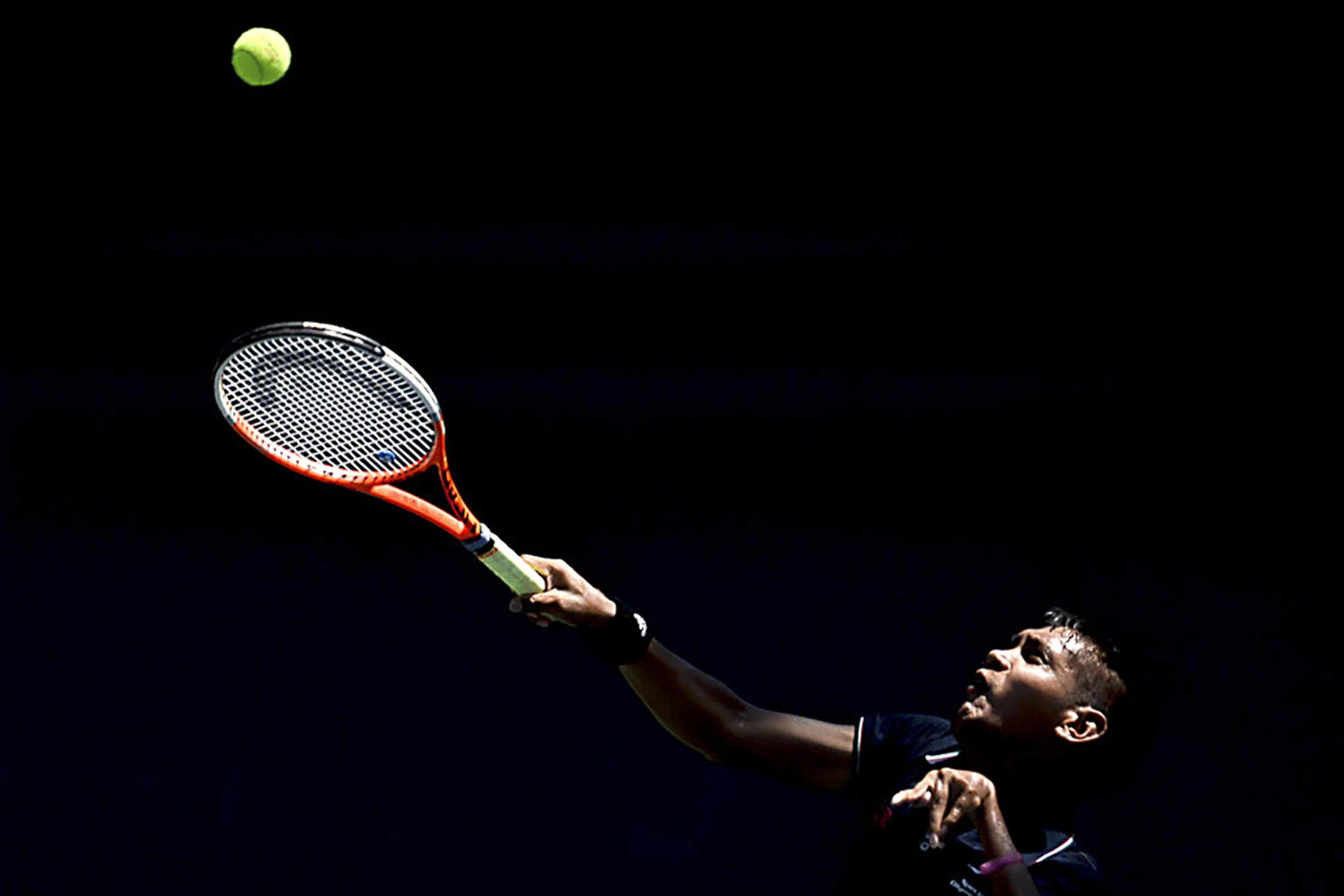  Special Olympics World Games tennis athlete servers the ball at the Los Angles Tennis Center located in the University of California of Los Angles, Calif., on July 31, 2015.&nbsp; 