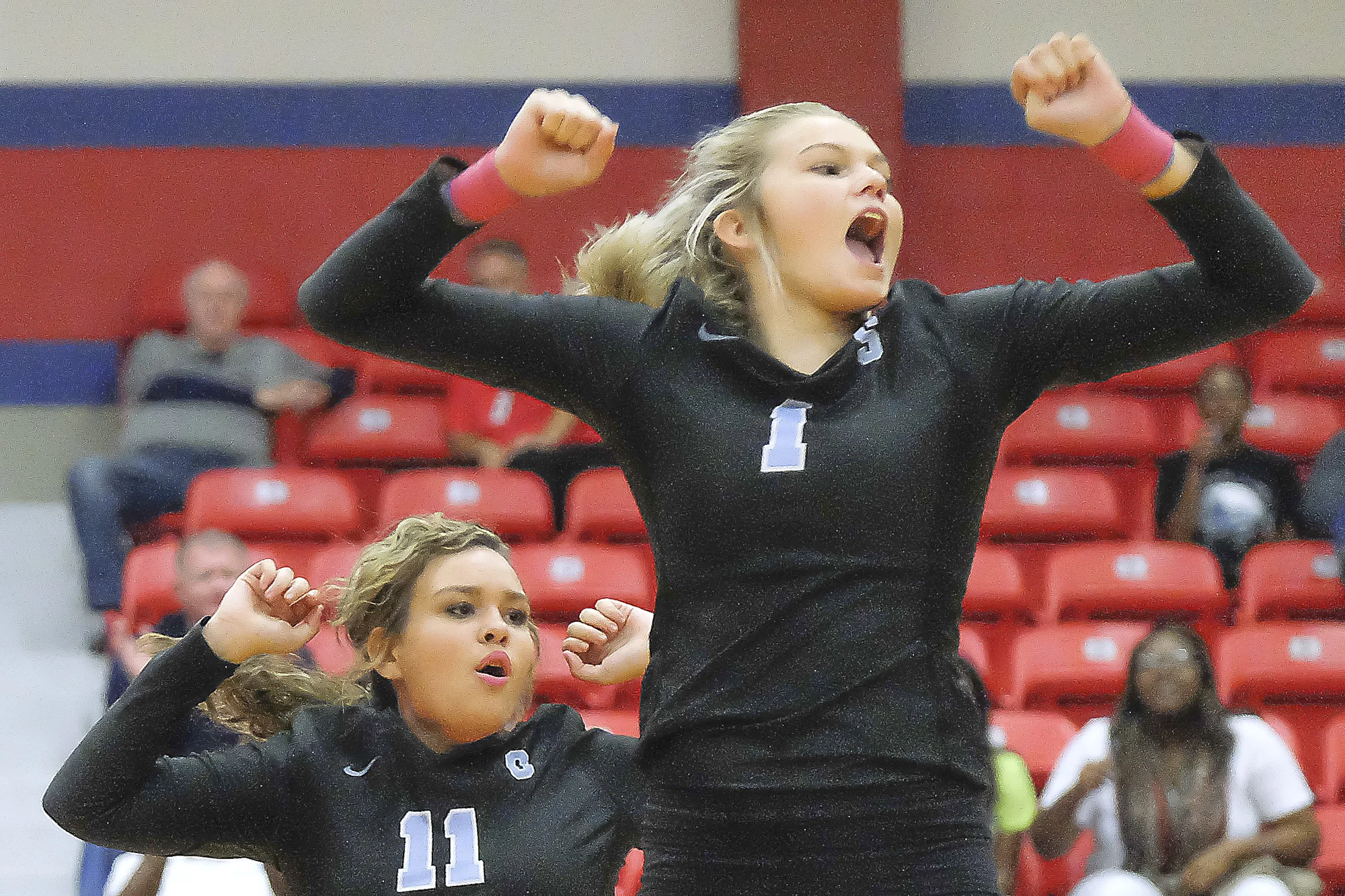  Megan Kessler (1) and Marissa Soistman (11) of Sweeny celebrate after a team score against Brazosport High School on Friday, Oct. 27, 2018, in Freeport, Texas. 