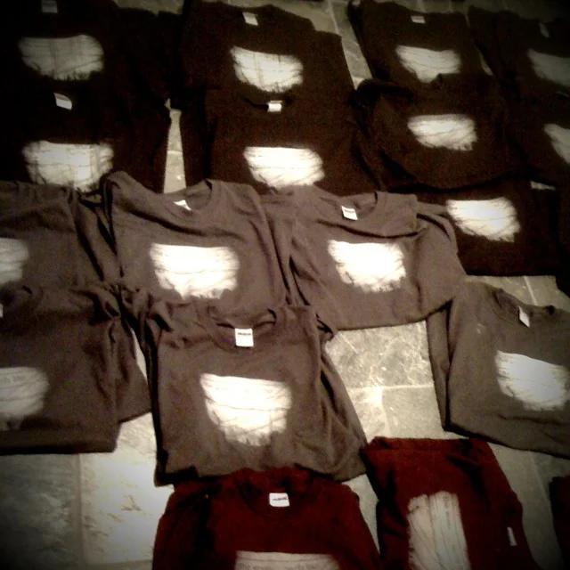 Two-City Tour shirt remainders