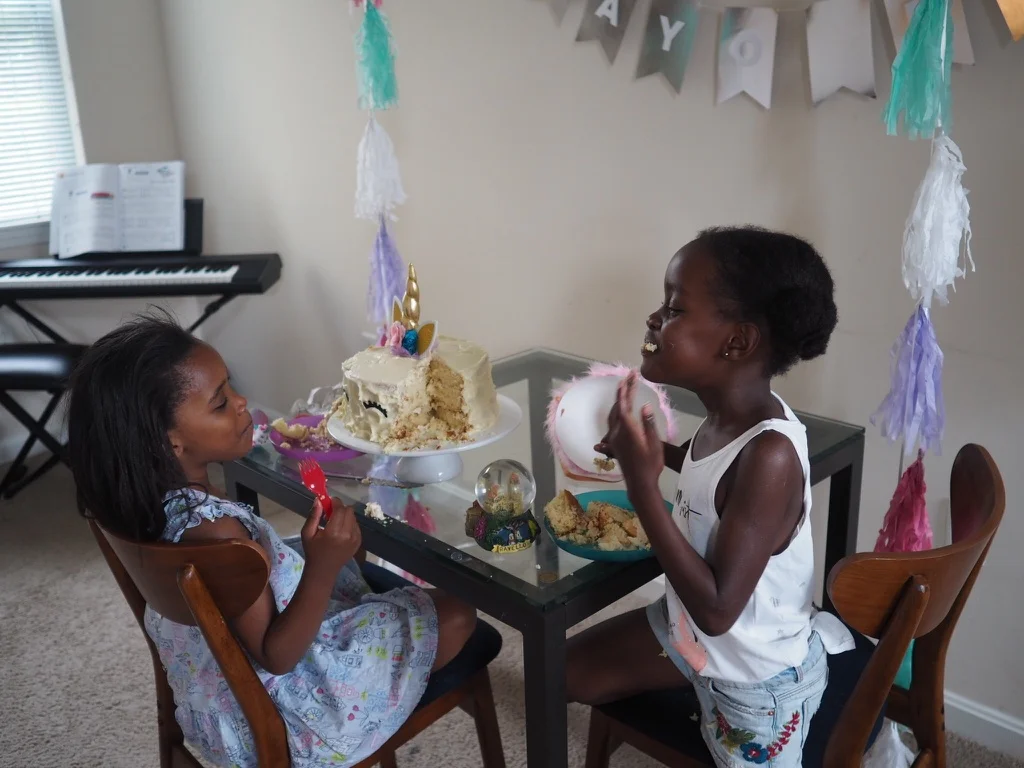 we served cupcakes at the party to make things simpler. as soon as we got home, these 2 changed and had a little tea party of their own with the cake!