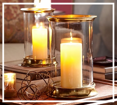Add candlelight to any space These 'Arlington Hurricanes' from Pottery Barn are a great way to do so - and add a metallic touch