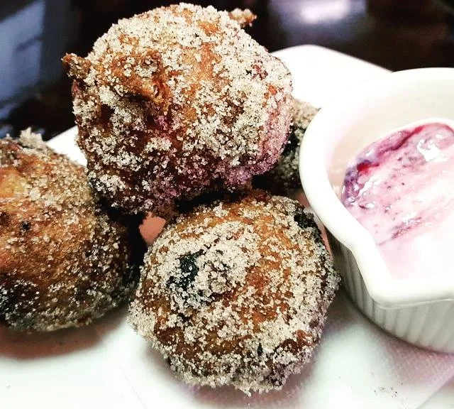 Blueberry Fritters with dipping sauce.