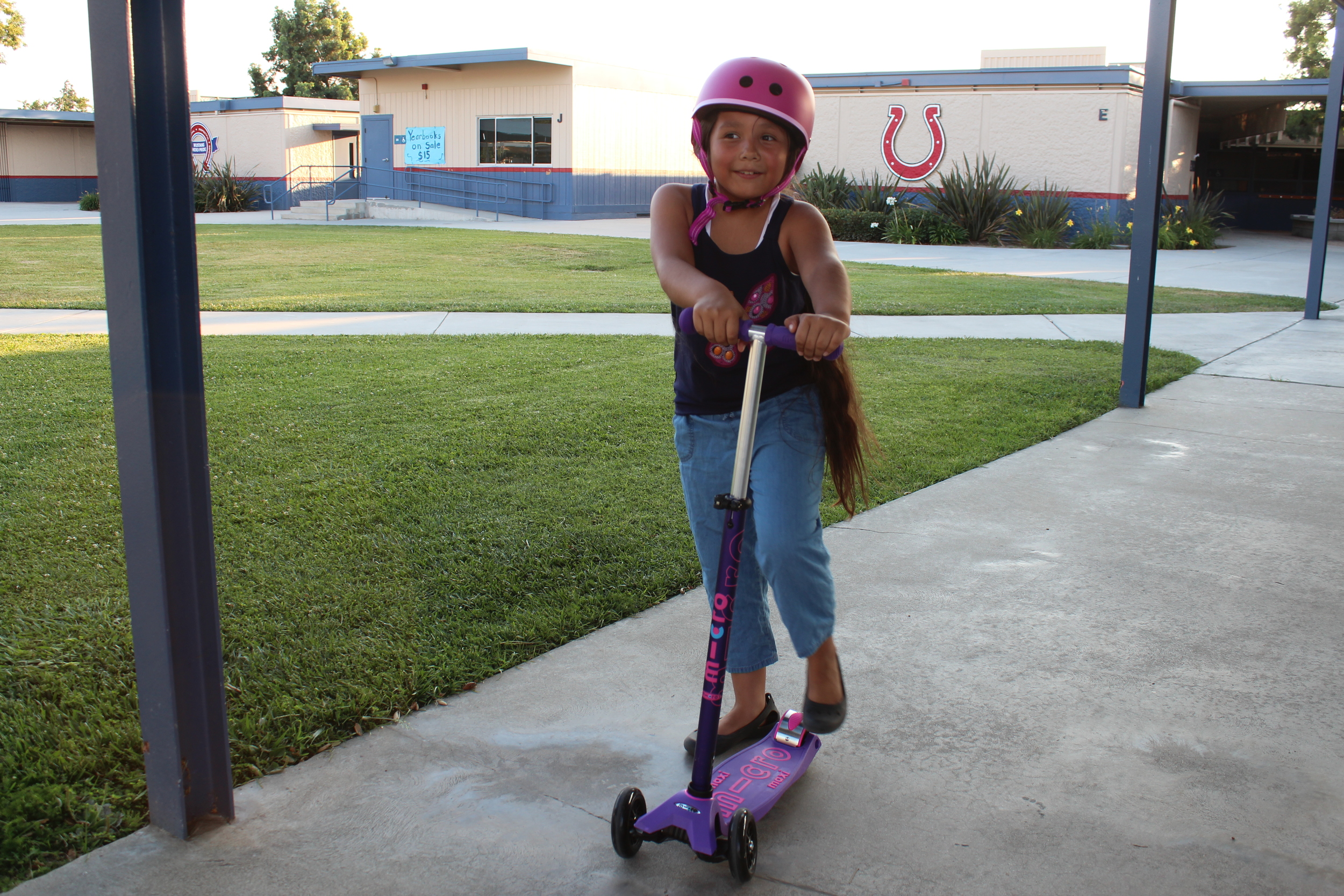 After school fun while building her confidence, love this! And she's all about safety with her matching helmet too.