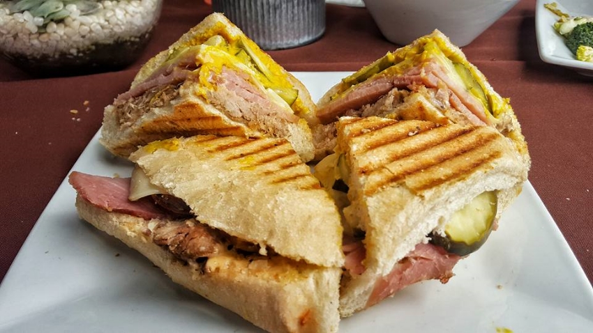 Cubano Stefano Golden Baked Ham, Carnitas, Swiss Cheese, Dill Pickle, Stefano Mayo, & Yellow Mustard.