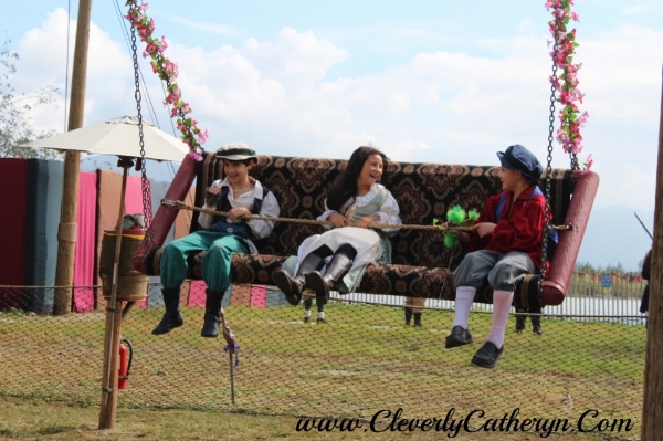 Their smiles say it all! This swing is a big hit at the Faire.