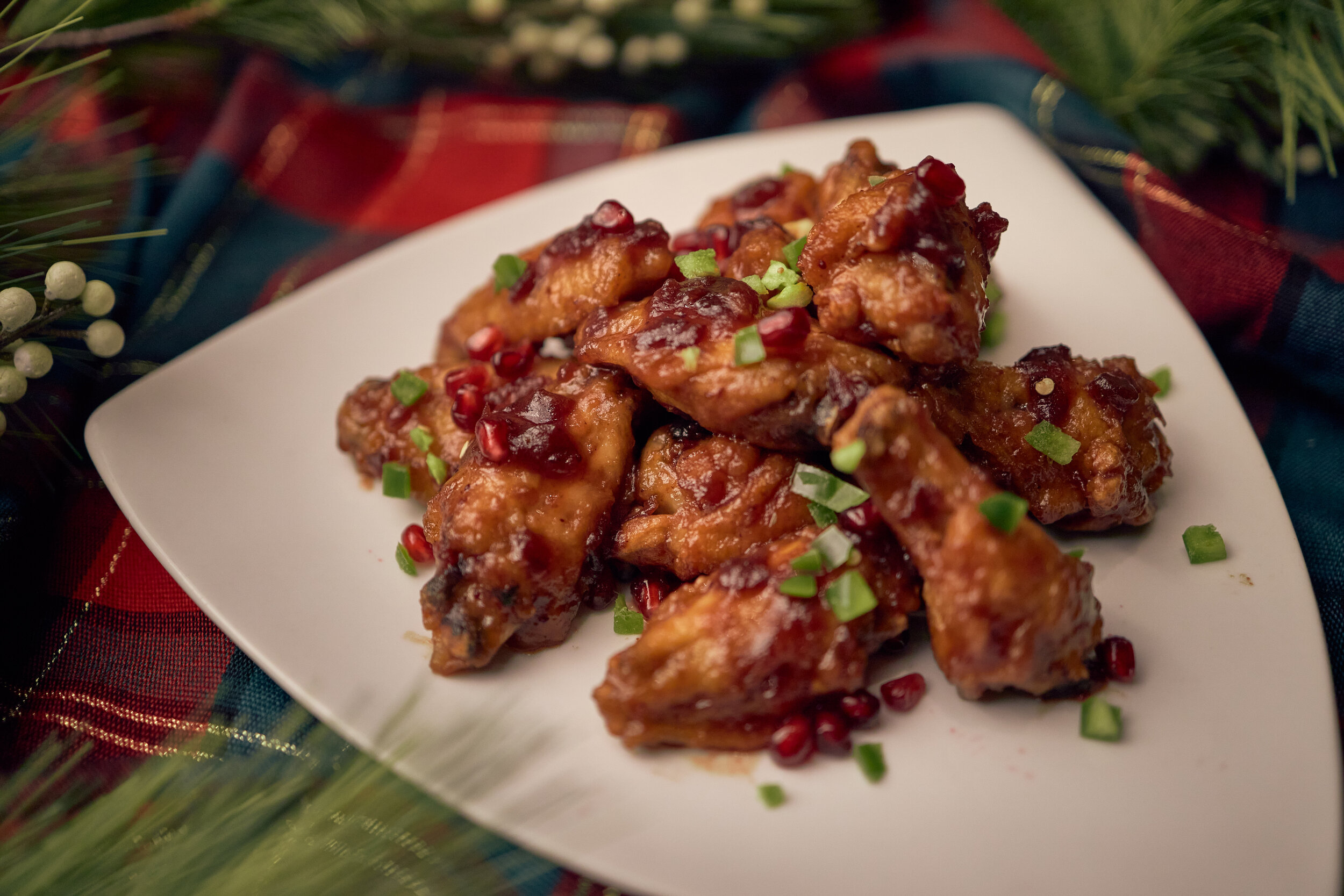 Scrooge’s Spicy CranberryPomegranate Glazed Wings.jpg