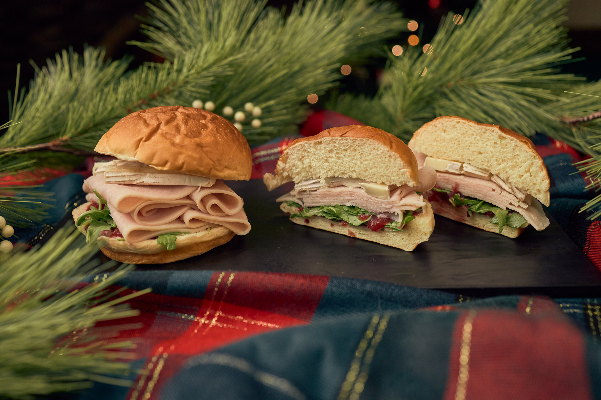 Deli Style Turkey, Brie, and Arugula Sandwich with a Boysenberry-Cranberry Relish, served with French Fries