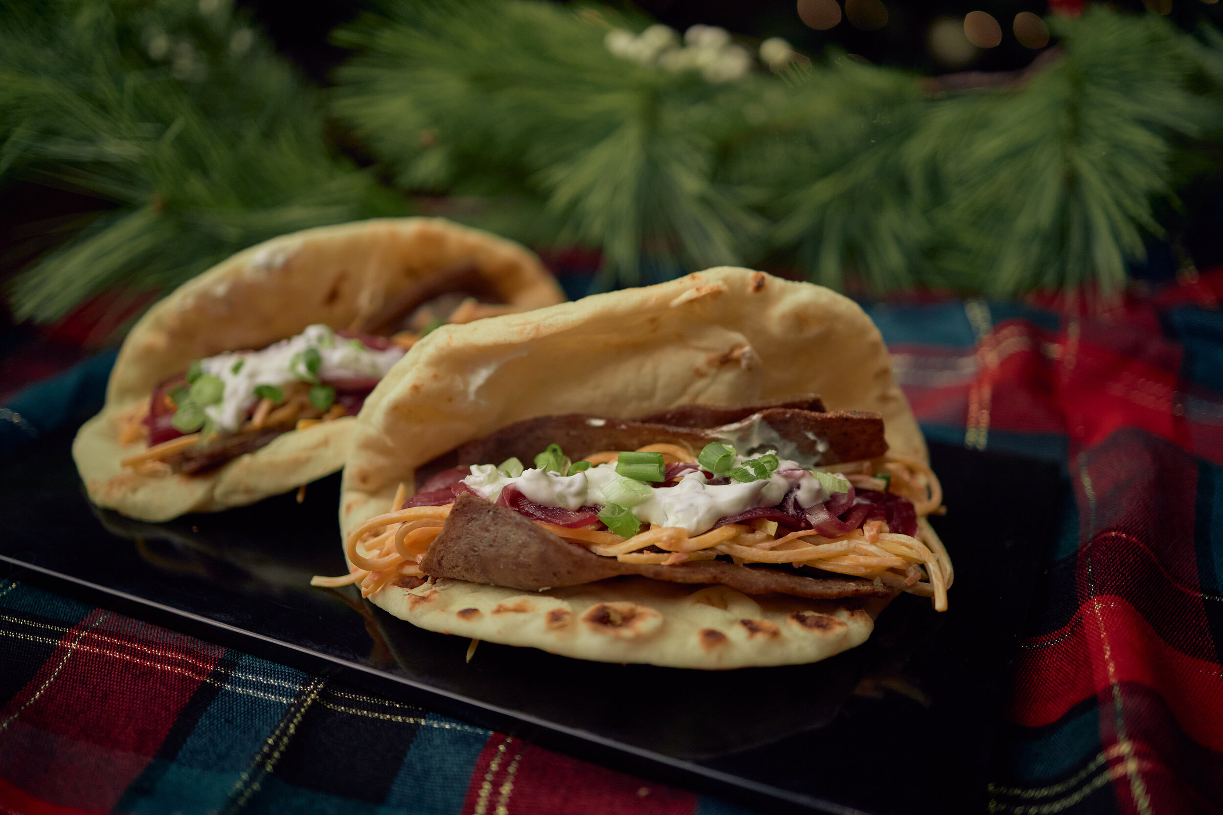 Gyro with Butternut Squash Slaw, Tzatziki, and Pickled Red Onions in a Naan Bread