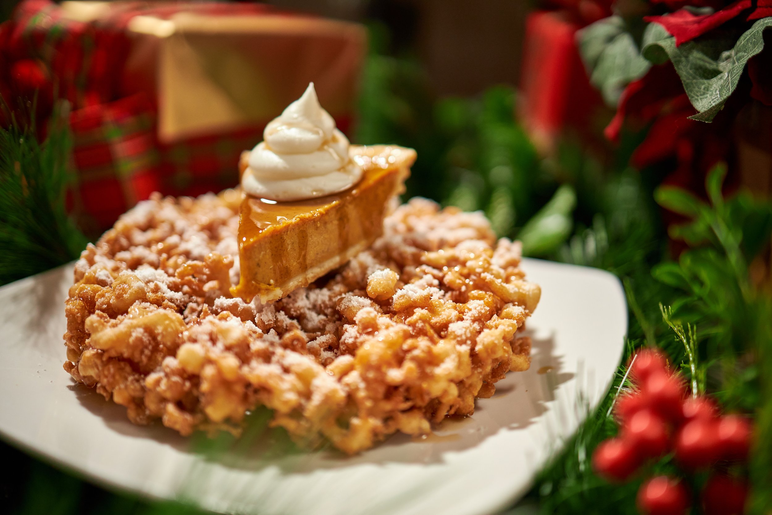 Prancer's Pumpkin Pie Funnel Cake with Maple Syrup and Whipped Cream