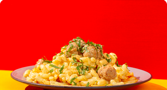 Jose Peterson’s Swedish Meatball on top of Mac and Cheese and French Fries