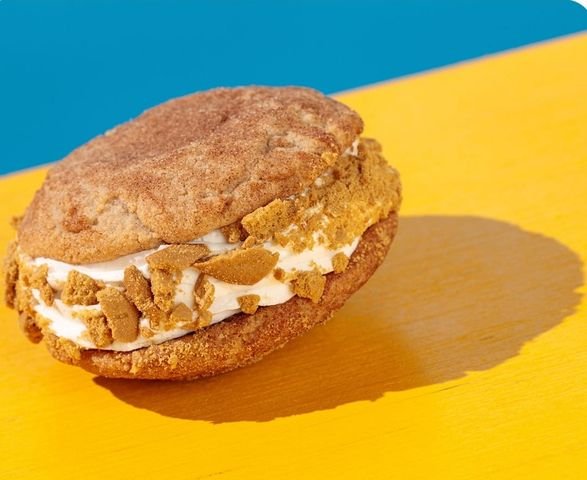 Cheesecake Cookiewich with Vanilla Soft Serve and rolled in Graham Cracker Crumbs